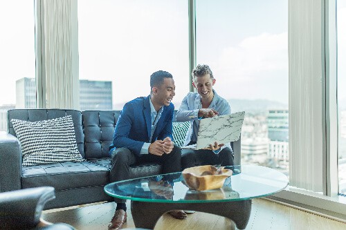 8-business-blogging-tactics-to-generate-more-sales-two-excited-men-clio-websites