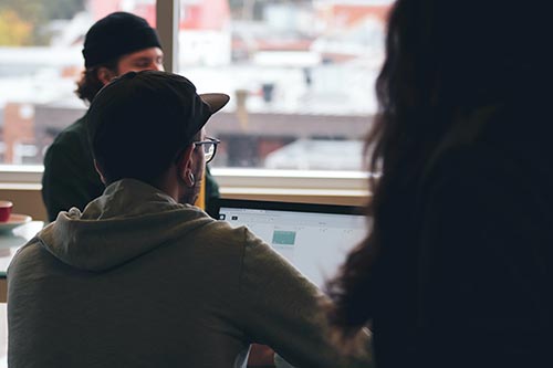 9-ecommerce-SEO-tips-that-work-in-2022-man-on-laptop-clio-websites