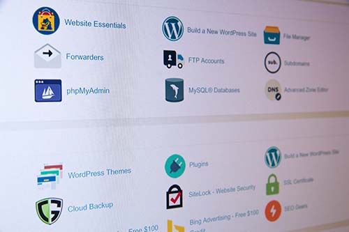 Screenshot of a website management dashboard showcasing icons for essential tools like WordPress, file manager, MySQL databases, plugins, and themes. Features such as building sites and enhancing security illustrate how a website can help you grow your business effectively. - Clio Websites | Top Canadian Web Design Company