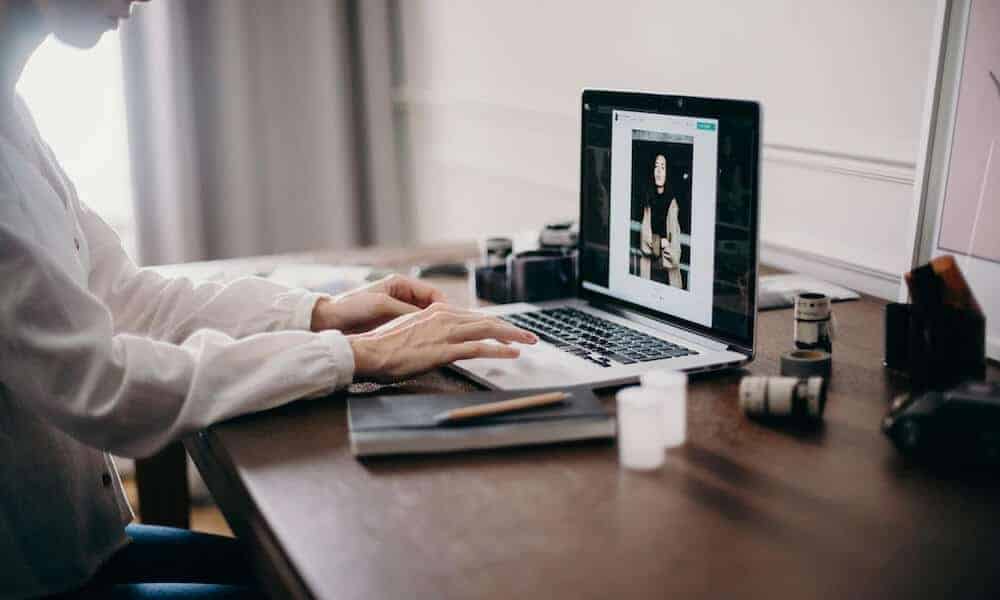 website-maintenance-costs-clio-websites-woman-working-on-desktop