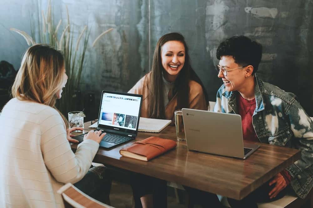 people-laughing-in-office-clio-websites