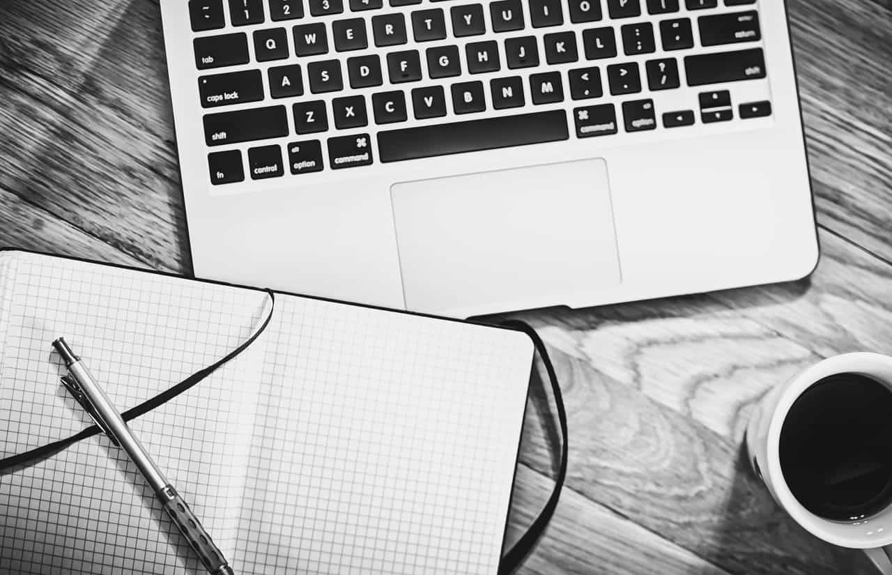 how-to-start-a-web-design-business-wp-planning-clio-websites-computer-and notebook