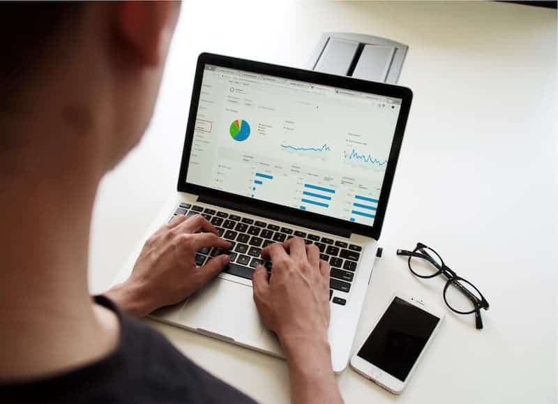 website-management-monitoring-traffic-man-using-laptop