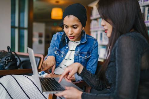 website-startup-costs-clio-websites-small-business-ladies-collaborating