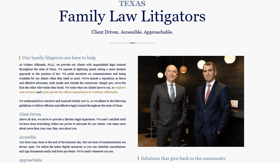 Two individuals in formal attire stand in an office setting. This image, featured on the Texas Family Law Litigators' law firm website, underscores their client-driven, accessible, and approachable services. The text emphasizes their dedication to personalized legal assistance for every client. - Clio Websites | Top Canadian Web Design Company