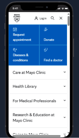 A smartphone screen displays the Mayo Clinic mobile website, showcasing website navigation design with menu options like Request appointment, Find a doctor, and Health Library—ideal for those seeking navigation inspiration. - Clio Websites | Top Canadian Web Design Company
