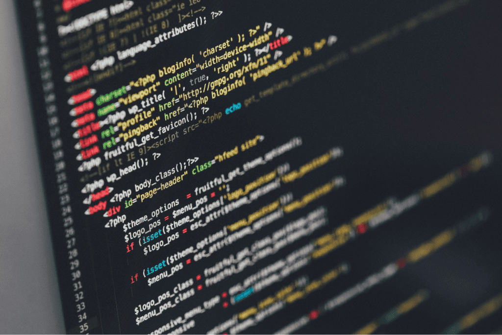 A close-up of a computer screen showcases colorful lines of PHP code essential for eCommerce, with various functions, variables, and syntax highlighted. It's a vital glimpse for business owners looking to understand website costs and the intricacies behind their digital storefronts. - Clio Websites | Top Canadian Web Design Company