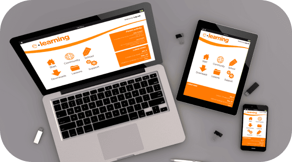 A laptop, tablet, and smartphone showcase an e-learning platform with orange icons and text, highlighting its responsive web design. USB drives and a pen are scattered around the devices on a gray surface. - Clio Websites | Top Canadian Web Design Company