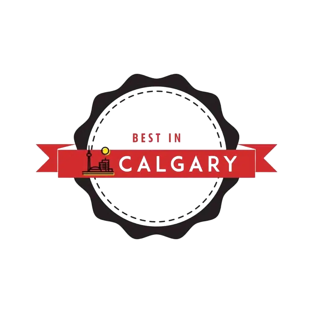 A circular emblem with a red ribbon across the center, displaying "Best in Calgary." The ribbon features a small illustration of city buildings on the left side, reminiscent of Clio websites. The emblem is framed by a gear-like black border. - Clio Websites | Top Canadian Web Design Company