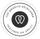 Circular badge with a black and white design. It features a stylized heart icon in the center and is surrounded by the text: "Top Website Developer Featured on UpCity. - 极速168体彩赛车号码历史结果预测-一分钟查询全历史记录查询-极速汽车168官网记录